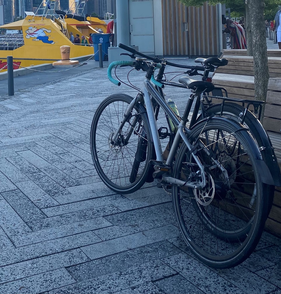 Grey Trek Bicycle with Teal Tape on handlebars