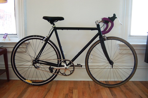 No branding - Glossy black with purple taped handles