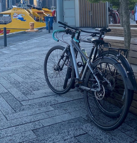 Grey Trek Bicycle with Teal Tape on handlebars